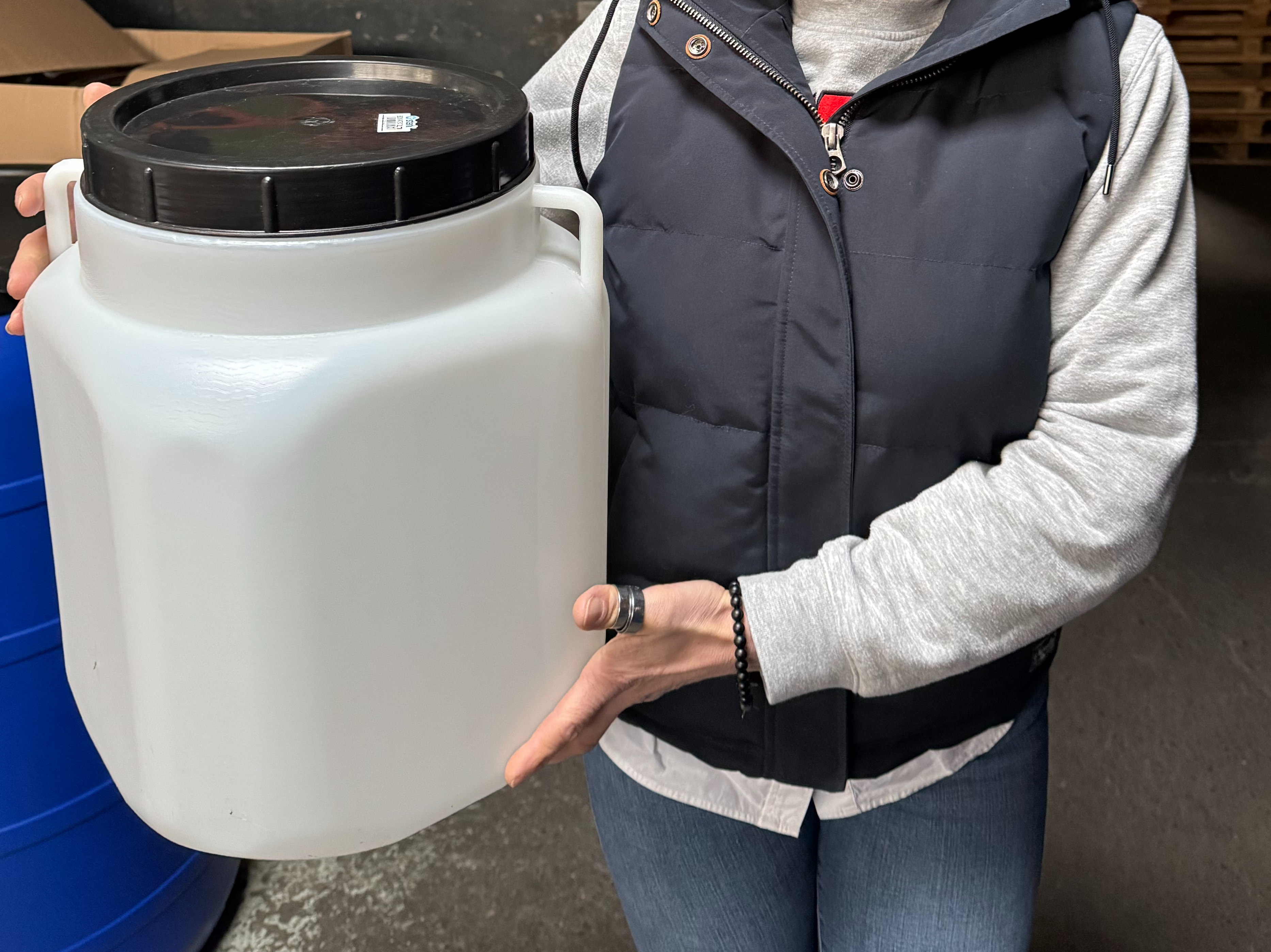 Plastic 5L water and food storage jug by Jordan & Jordan with large opening, durable, leak-proof, suitable for potable water and food.